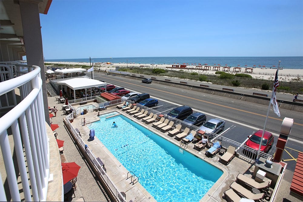 View of Montreal Beach Resort with oceanfront pool.