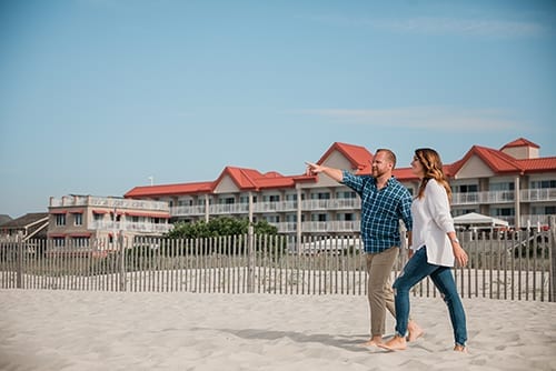 Photo of couple near beach and Montreal Beach Resort